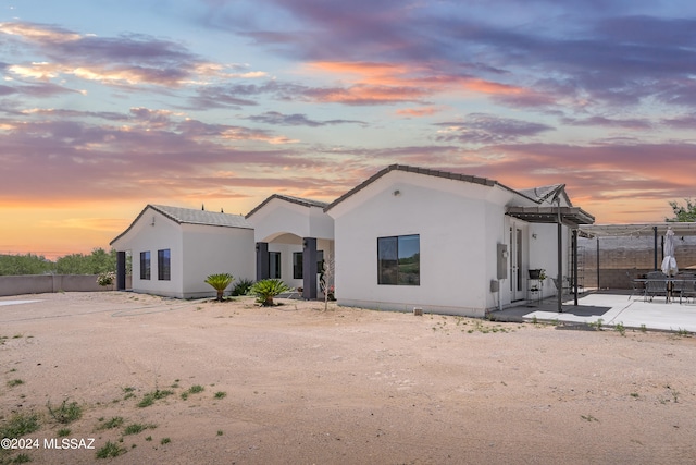 view of front of home with a patio