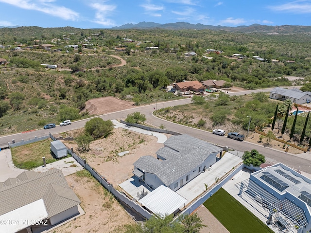 drone / aerial view featuring a mountain view