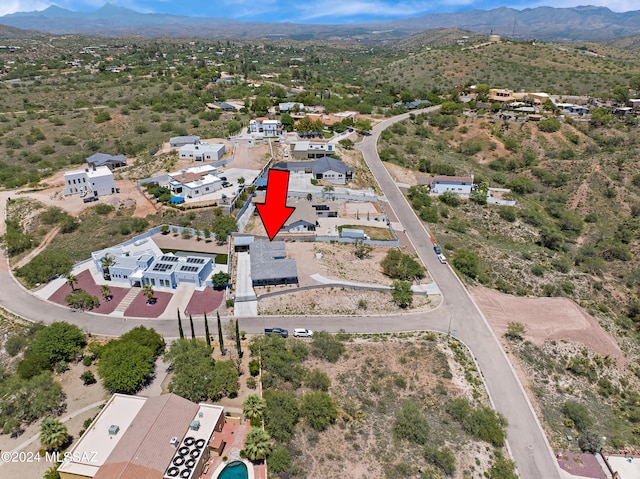 bird's eye view with a mountain view