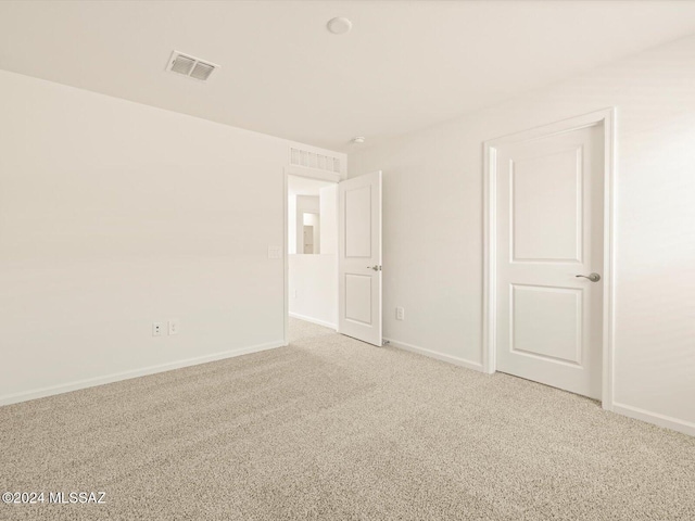 unfurnished room with carpet