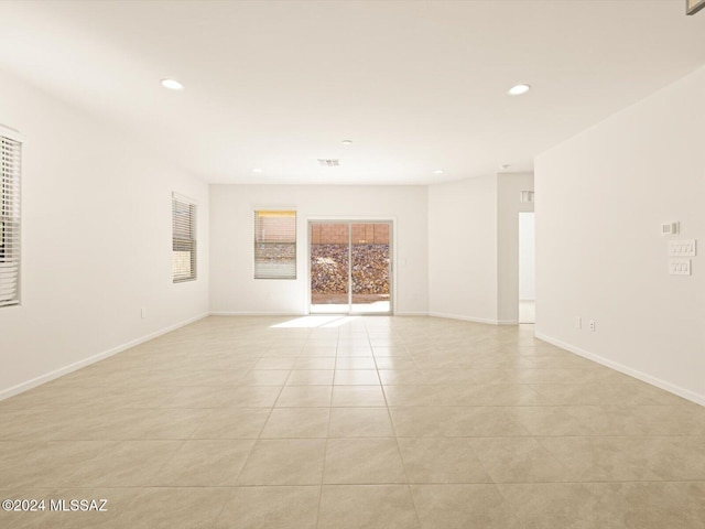 empty room featuring light tile patterned flooring