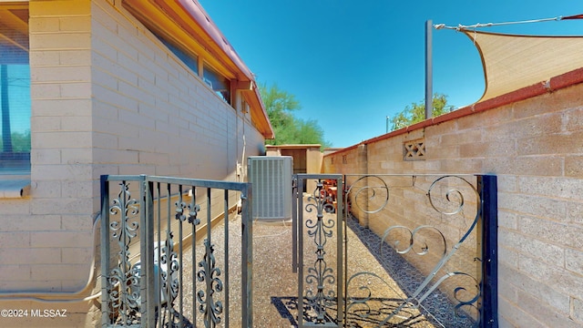 view of gate featuring central AC