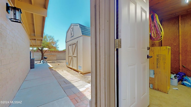 view of property exterior with a shed