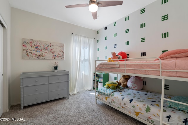 bedroom featuring ceiling fan and light colored carpet