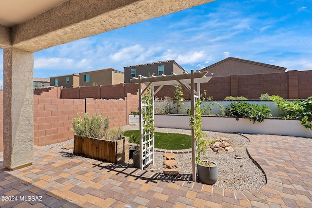 view of patio / terrace featuring a pergola