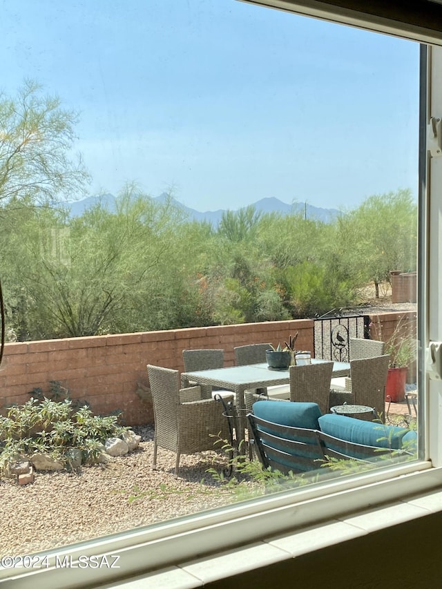 balcony featuring a mountain view