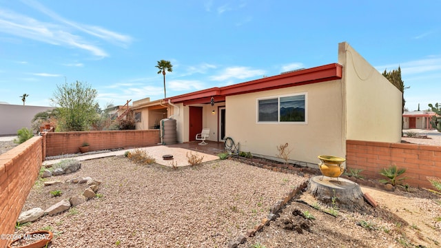 back of house featuring a patio