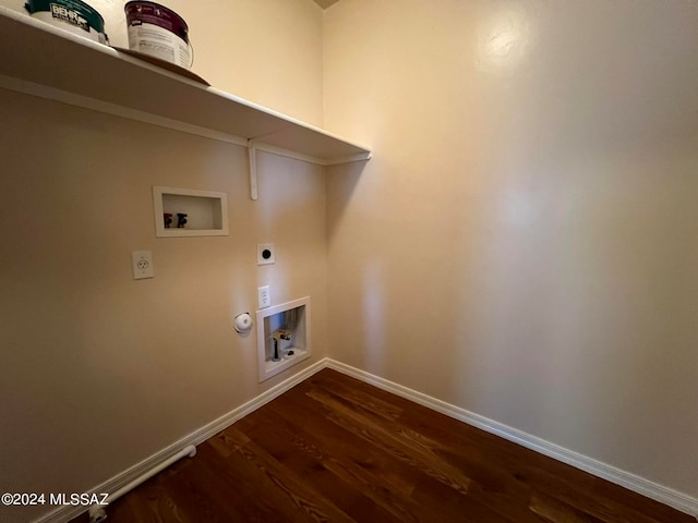 laundry area featuring hookup for a washing machine, dark hardwood / wood-style floors, hookup for an electric dryer, and hookup for a gas dryer