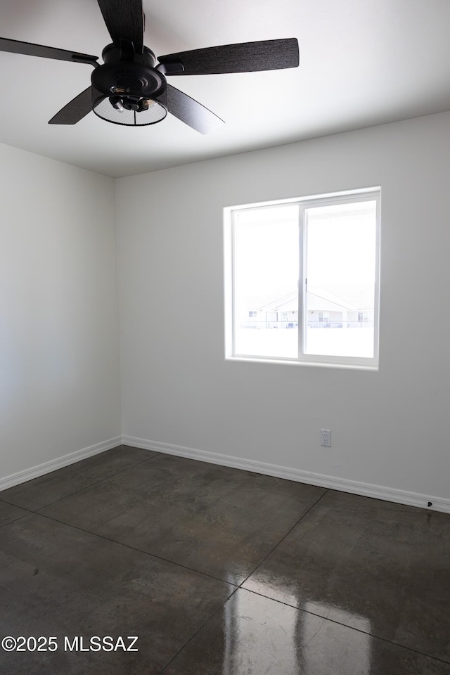 empty room featuring ceiling fan