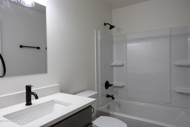 full bathroom with vanity, toilet, and shower / washtub combination