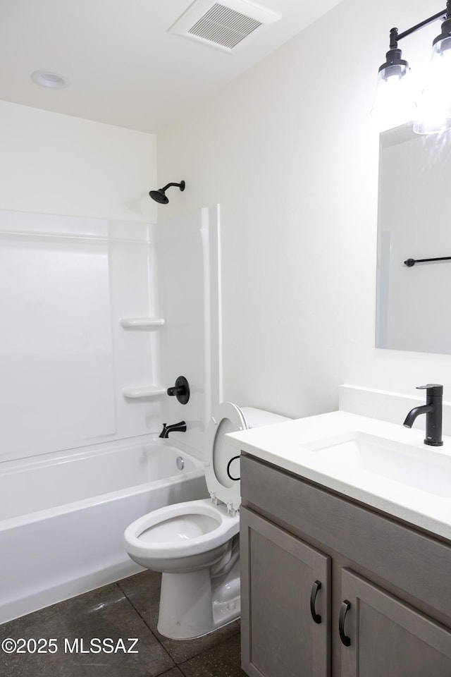 full bathroom featuring vanity, tile patterned flooring, toilet, and shower / bath combination