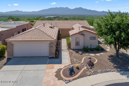 view of front of house with a mountain view and a garage