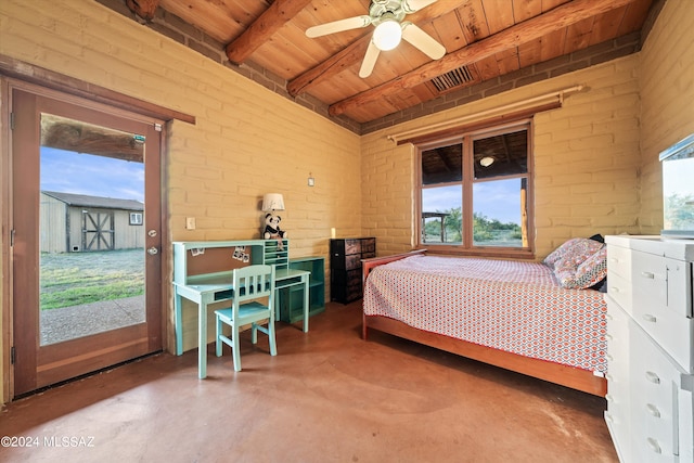 bedroom with beamed ceiling, concrete flooring, brick wall, and ceiling fan