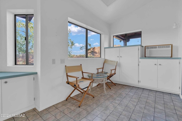 sitting room with a wall unit AC