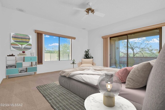 spare room featuring ceiling fan, carpet floors, and a healthy amount of sunlight