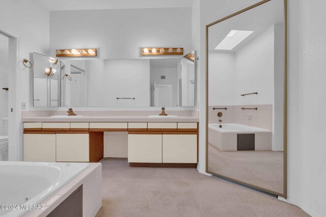 carpeted empty room featuring ceiling fan and a textured ceiling