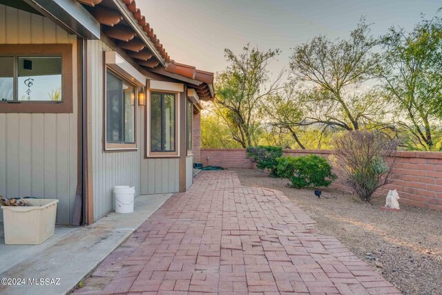 back of house with a patio area