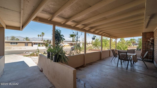 view of patio / terrace with a mountain view