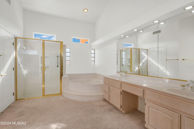 bathroom featuring vanity and plus walk in shower