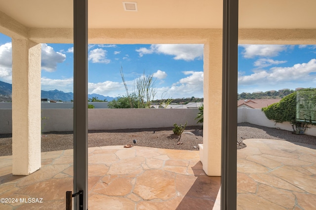 view of patio featuring a mountain view