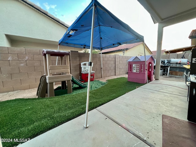 view of patio / terrace featuring a playground