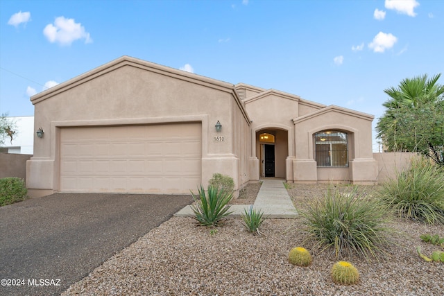 adobe home with a garage