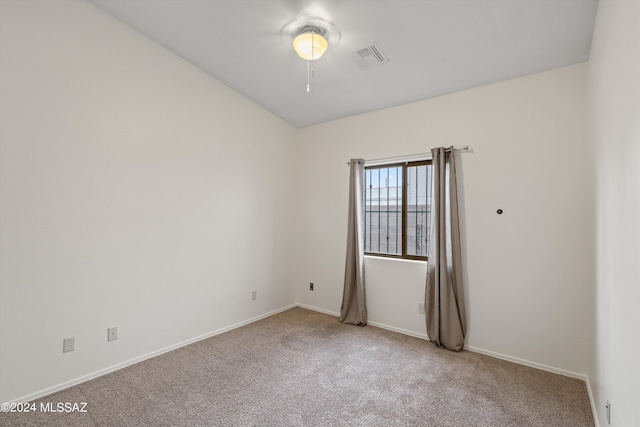 view of carpeted spare room