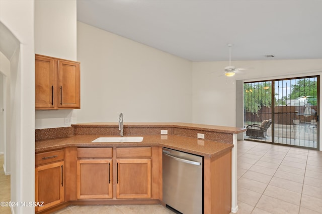 kitchen with dishwasher, lofted ceiling, light tile patterned floors, and ceiling fan