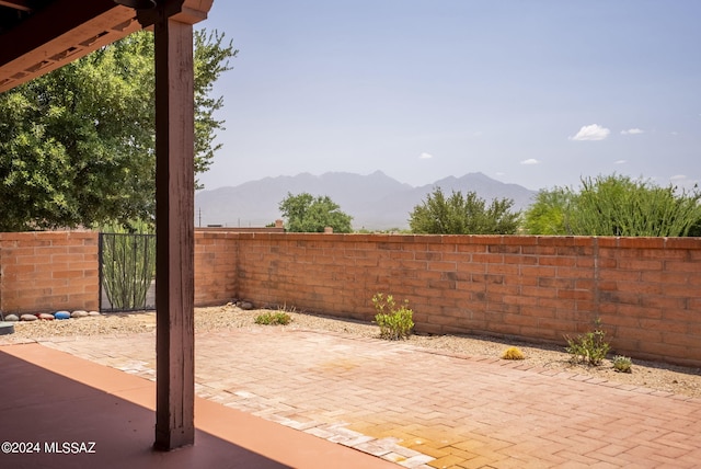 view of patio featuring a mountain view