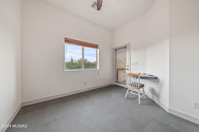 unfurnished office featuring ceiling fan