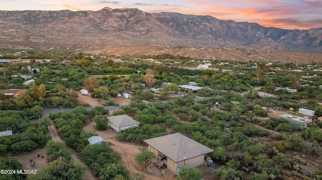 aerial view at dusk with a mountain view