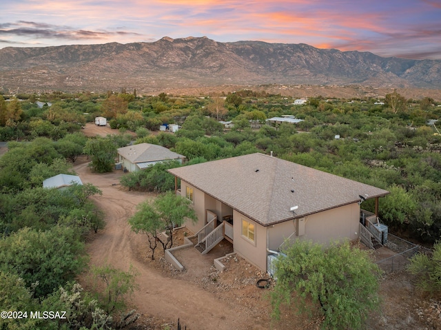 aerial view at dusk with a mountain view