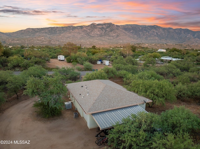 aerial view at dusk with a mountain view