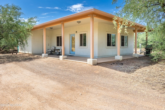 back of house featuring a patio