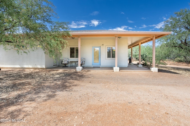 back of house featuring a patio