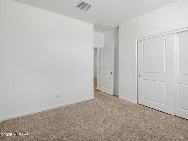350 N Pecan Canyon Ln, Sahuarita, AZ 85629 - unfurnished bedroom featuring carpet, baseboards, and a closet