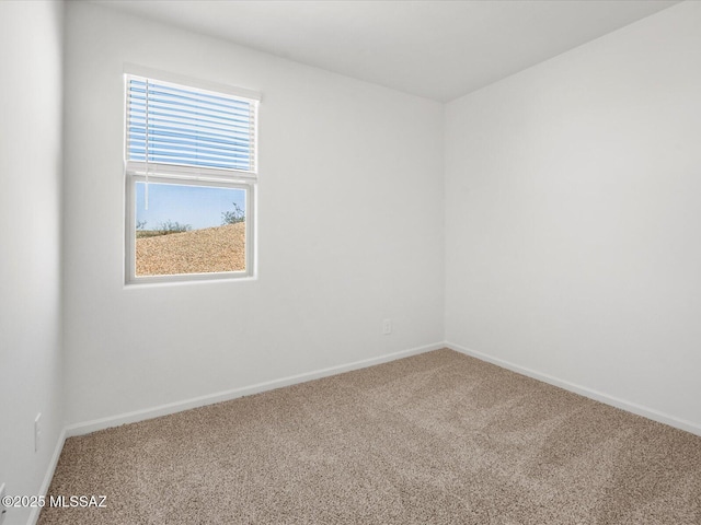 350 N Pecan Canyon Ln, Sahuarita, AZ 85629 - carpeted empty room featuring baseboards