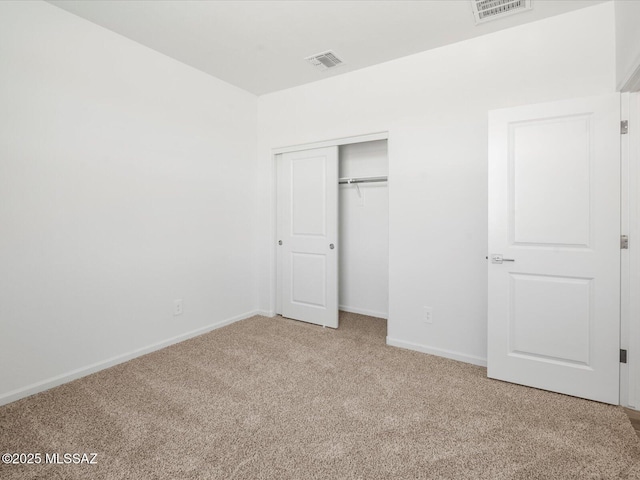 350 N Pecan Canyon Ln, Sahuarita, AZ 85629 - unfurnished bedroom with carpet, baseboards, and a closet