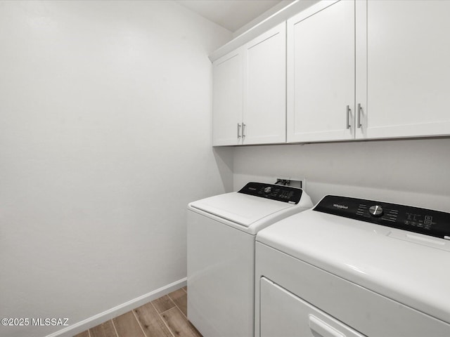 350 N Pecan Canyon Ln, Sahuarita, AZ 85629 - laundry room featuring cabinet space, independent washer and dryer, light wood-style flooring, and baseboards