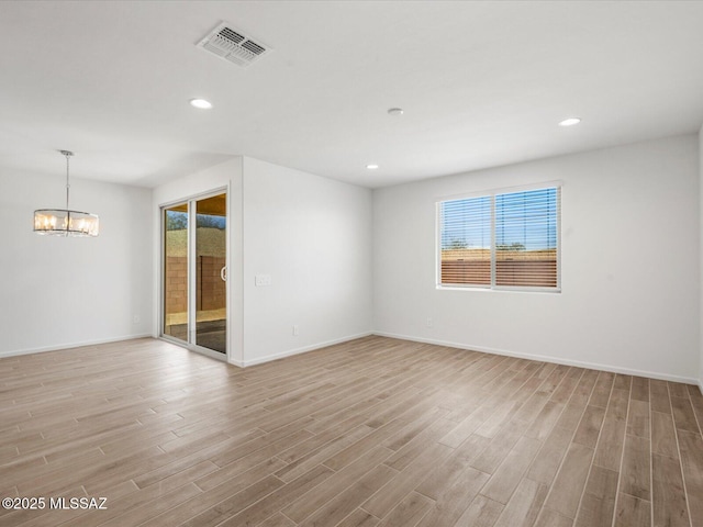350 N Pecan Canyon Ln, Sahuarita, AZ 85629 - unfurnished room with a chandelier, light wood-type flooring, baseboards, and recessed lighting