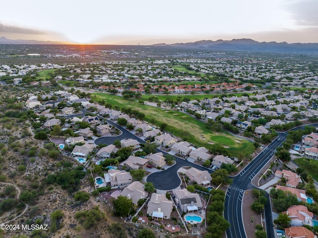 aerial view at dusk with a mountain view