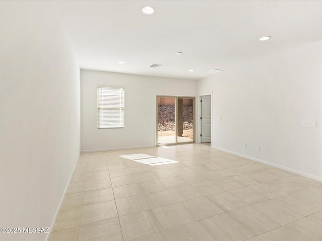 7005 W Jadewood Ln W, Tucson, AZ 85757 - empty room featuring visible vents, recessed lighting, and baseboards