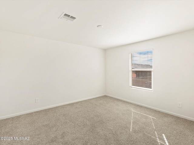 7005 W Jadewood Ln W, Tucson, AZ 85757 - carpeted spare room with baseboards and visible vents
