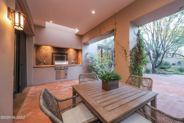 view of patio / terrace featuring a grill and area for grilling