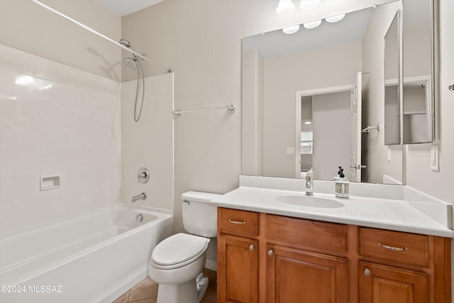 full bathroom with vanity, toilet, tile patterned floors, and washtub / shower combination