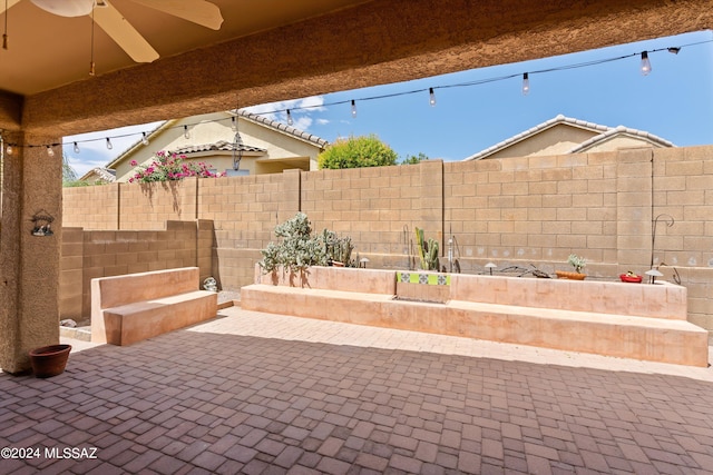 view of patio / terrace featuring ceiling fan