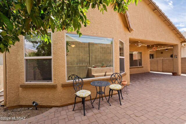 view of patio / terrace with ceiling fan