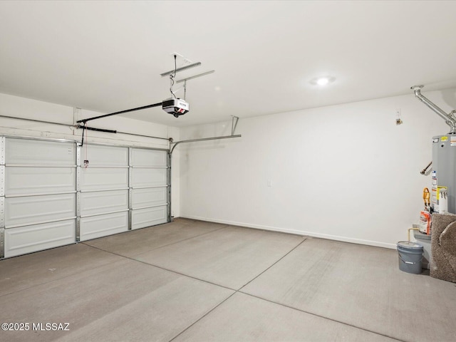 garage with a garage door opener, water heater, and baseboards