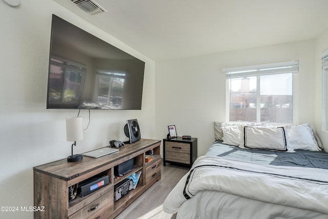 bedroom featuring light wood-type flooring