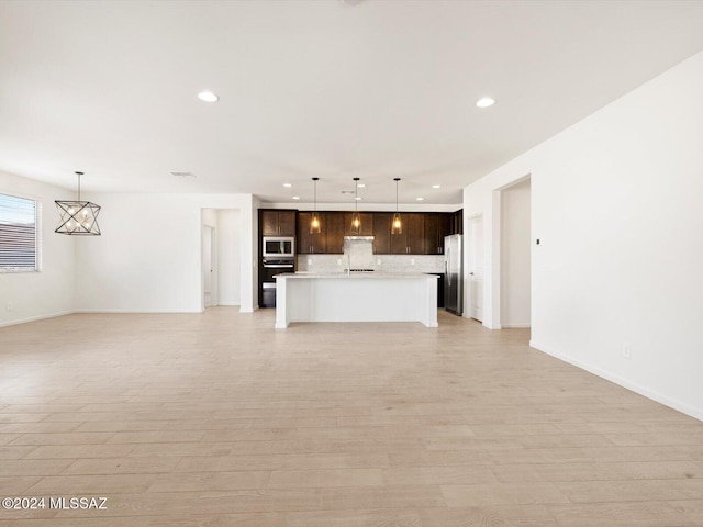 unfurnished living room featuring light hardwood / wood-style floors